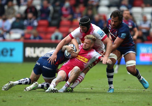 Tyrone Green clings on to the ball