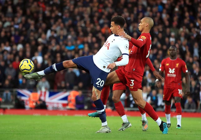 Dele Alli, left, was criticised for his performance at Liverpool
