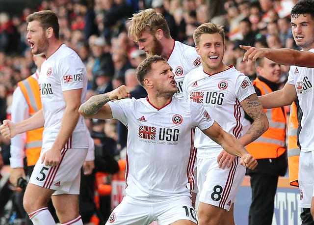 Sheffield United captain Billy Sharp, centre, celebrates wildly after stepping off the bench to grab a late equaliser at Bournemouth on the opening weekend. Chris Wilder's newly-promoted Blades enjoyed a season to remember, securing a top-half finish in their first Premier League campaign since 2006-07