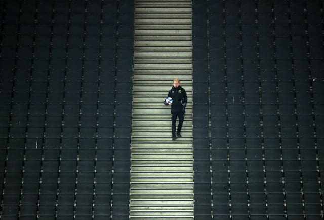 A ball boy gathers a ball during MK Dons' home Sky Bet League One match against Blackpool