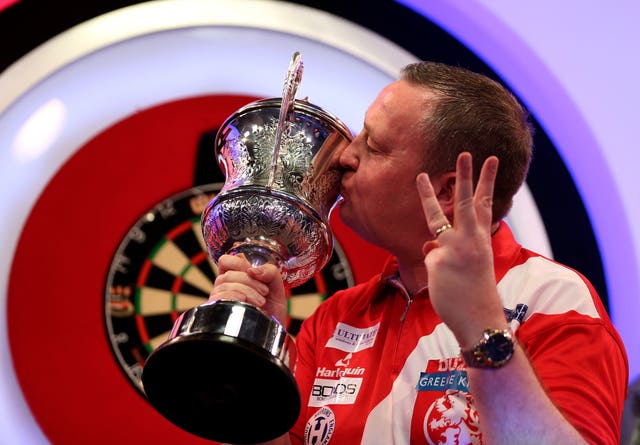 Glen Durrant celebrates winning a third successive BDO world title