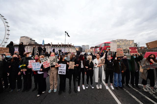 Demonstrators during a protest on Westminster Bridge, central London (Ian West/PA)