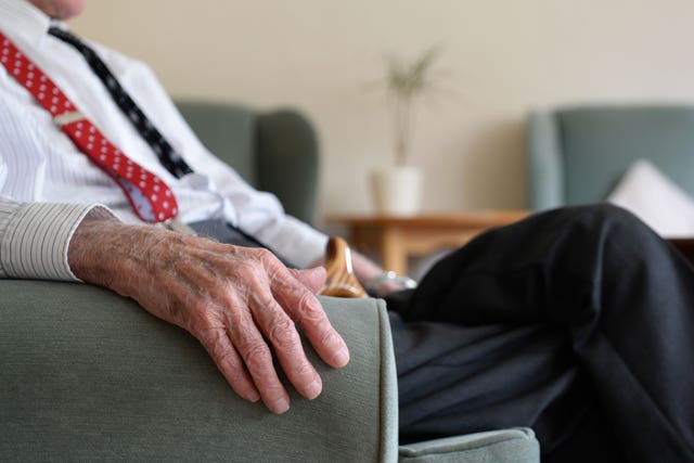 Elderly man in a chair