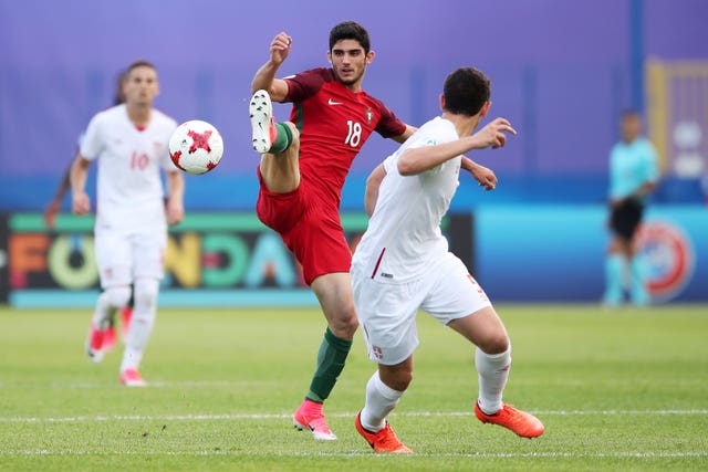 Portugal’s Goncalo Guedes (left)