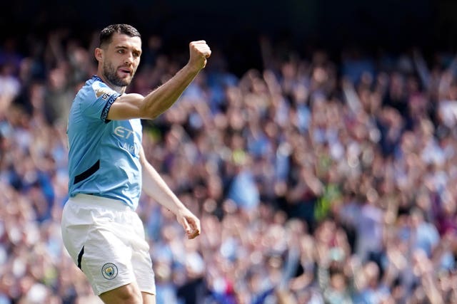 Manchester City's Mateo Kovacic punches the air during a game