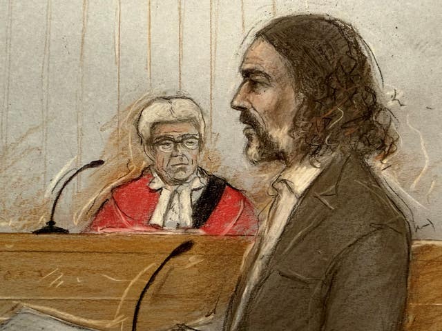 Court artist sketch of Judge Mr Justice Bennathan looking on as Russell Brand appears at Southwark Crown Court