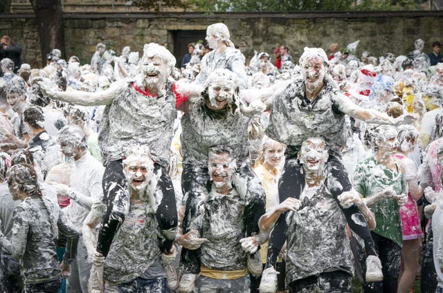 Hundreds of students take part in the traditional Raisin Monday foam fight on St Salvator’s Lower College Lawn at the University of St Andrews in Fife