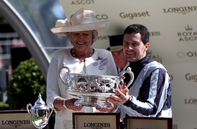 Jessica Harrington and Colm O'Donoghue picking up the Coronation Stakes trophy at Royal Ascot