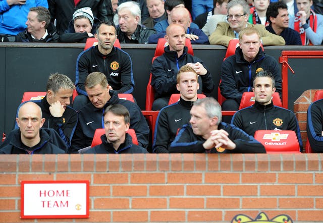 Paul Scholes, back right, was part of manchester United caretaker manager Ryan Giggs' coaching staff in 2014