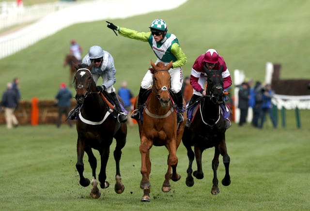 Stars of the present and future as the giant Topofthegame (middle) emerges the winner of a memorable tussle for the RSA Insurance Novices' Chase with Santini and Delta Work