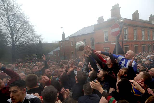 But the ball did get out of the crowd and into the air occasionally (Aaron Chown/PA)