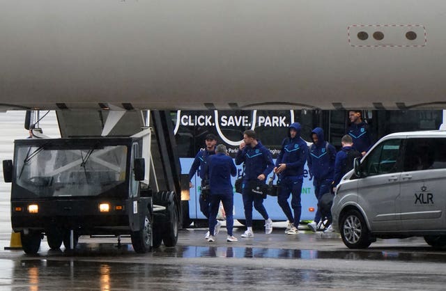England players board their plane