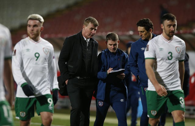 Stephen Kenny, centre, walks off the field