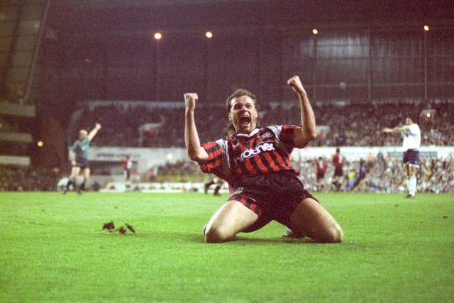 Uwe Rosler celebrates a goal for Manchester City