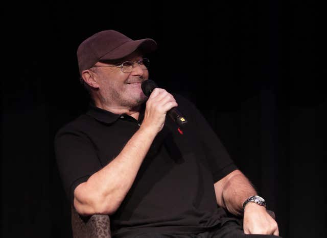 Phil Collins speaks to the media