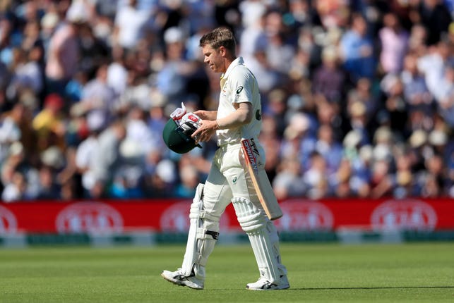 David Warner leaves the field after being dismissed