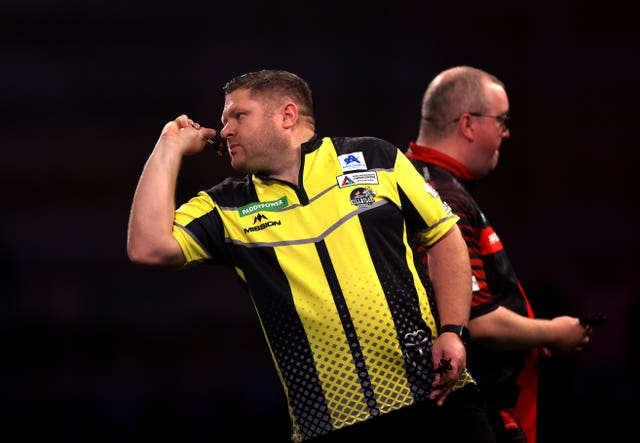 James Hurrell (left) during his match against Stephen Bunting at the PDC World Championship