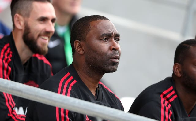 Andrew Cole has called for stiffer punishments to help stamp out racist chanting at games