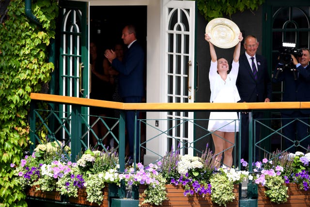 Halep showed off her title to the SW19 fans