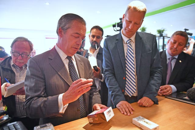 Nigel Farage visits a vape shop with Nathan Gill during the 2019 European elections