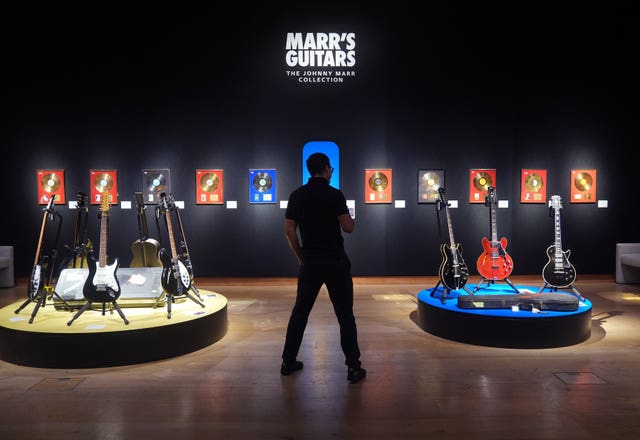 A selection of guitars on display during the preview at Christie’s in central London, of the auction house’s sale of The Johnny Marr Collection on September 17 in London