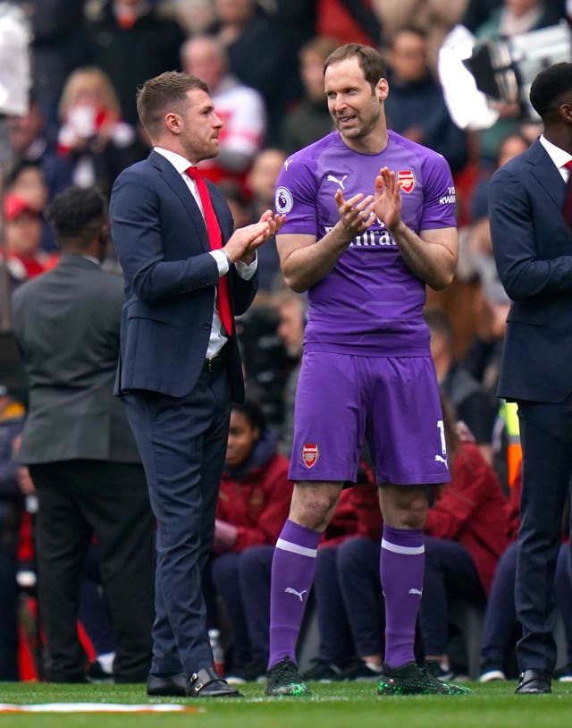 Aaron Ramsey, left, and Petr Cech applaud the Arsenal fans