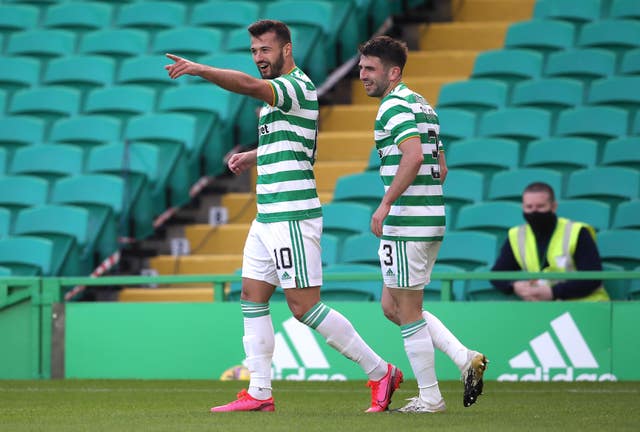 Celtic's Albian Ajeti (left) celebrates scoring his side's third goal 