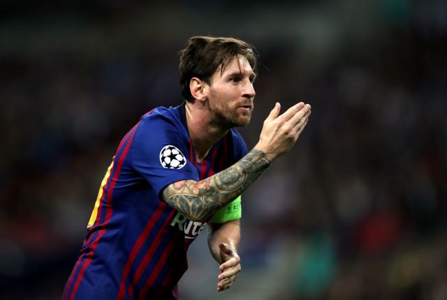 Barcelona’s Lionel Messi celebrates scoring his first goal