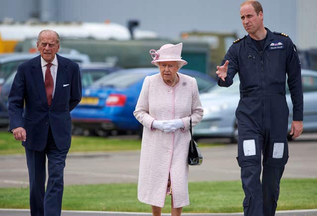 The Queen and Duke of Edinburgh with the Duke of Cambridge