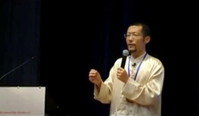 A screen grab taken from a video of a presentation by Hongchi Xiao on Paida Lajin therapy, which was shown to the jury at Winchester Crown Court