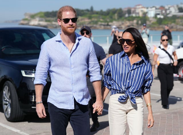 The Duke and Duchess of Sussex arrive to meet volunteer first responders from Bondi Surf Bathers’ Life Saving Club, during a visit to Bondi Beach