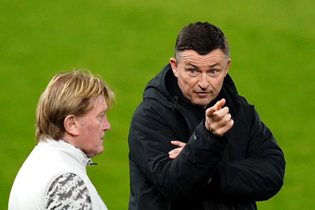 Preston manager Paul Heckingbottom, right, points toward the stand while talking to assistant Stuart McCall