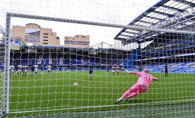 Jorginho, centre, scores the first of Chelsea's two penalties against Crystal Palace on Saturday