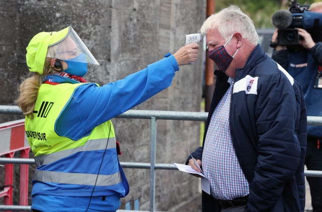 Fans have their temperatures checked on arrival in Dingwall 