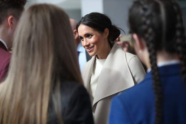 Pupils hailed the royal couple's down-to-earth attitude (Niall Carson/PA)