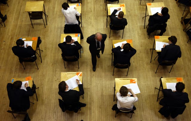 Pupils taking an exam (David Jones/PA)