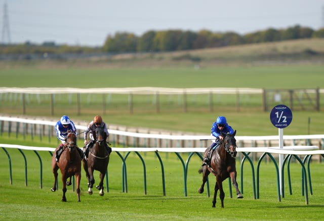 A general view of Talk Of New York ridden by William Buick (right) on their way to winning the Betway Joel Stakes
