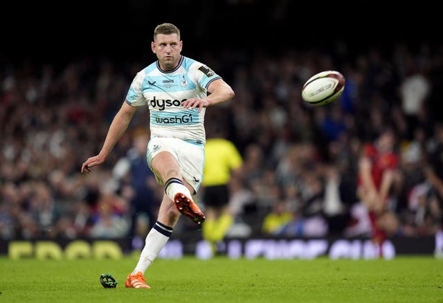 Finn Russell kicks a conversion