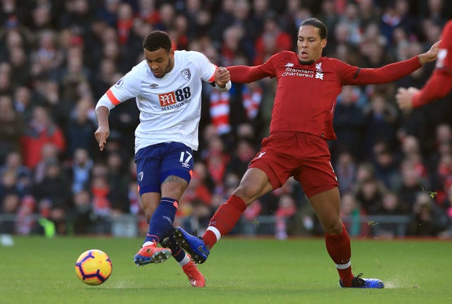 Virgil van Dijk, right, will be back for Liverpool this weekend (Peter Byrne/PA)