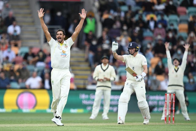 Australia’s Mitchell Starc (left) appeals unsuccessfully for the wicket of Zak Crawley