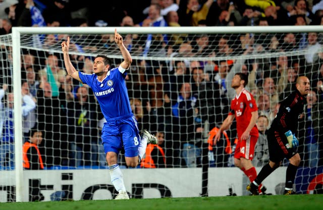 Frank Lampard, left, celebrates scoring against Liverpool