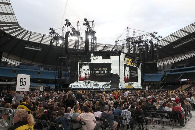 Crowds gather to watch Taylor Swift on stage as she opens her Reputation stadium tour at the Eitihad Stadium, Manchester.