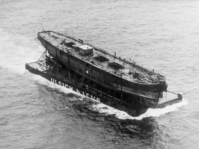 The SS Great Britain is towed back to the UK in 1970 on her pontoon