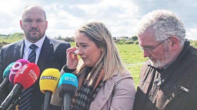 PSNI Detective Superintendent Jason Murphy, with Joanne Dorrian, sister of missing Co Down woman Lisa Dorrian and her father John Dorrian