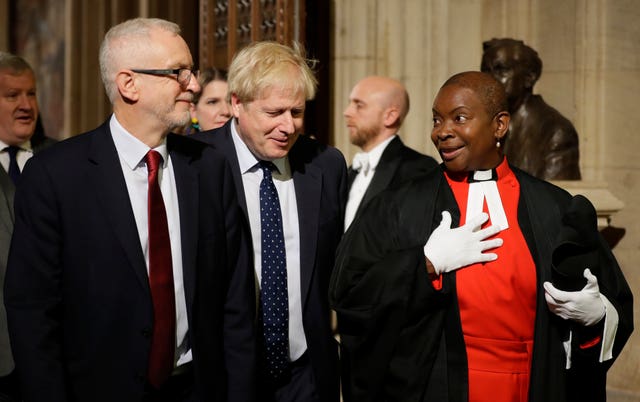 Prime Minister Boris Johnson, centre, and Labour leader Jeremy Corbyn with Speaker’s chaplain Rev Rose Hudson-Wilkin