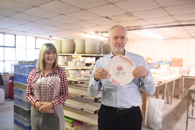 Jeremy Corbyn holds plate