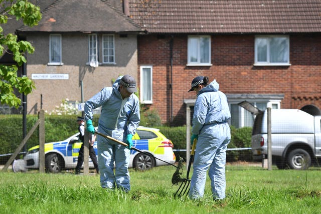 Police officers searching Waltheof Gardens (