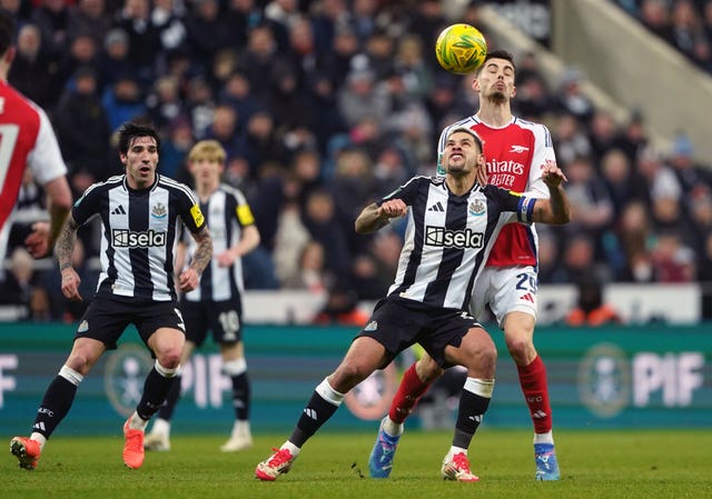 Newcastle’s Bruno Guimaraes and Arsenal’s Kai Havertz battle for the ball