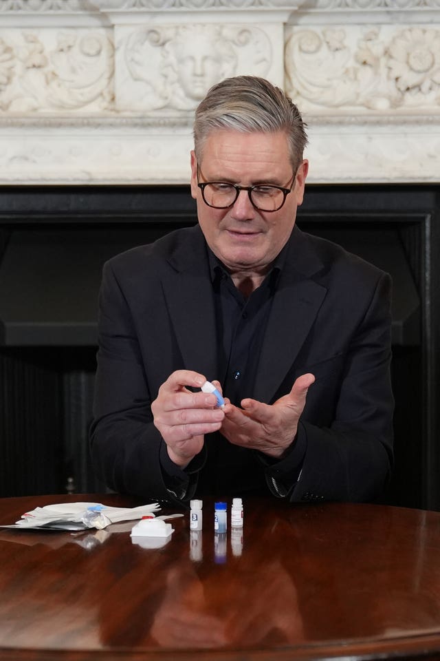 Sir Keir Starmer administers the test