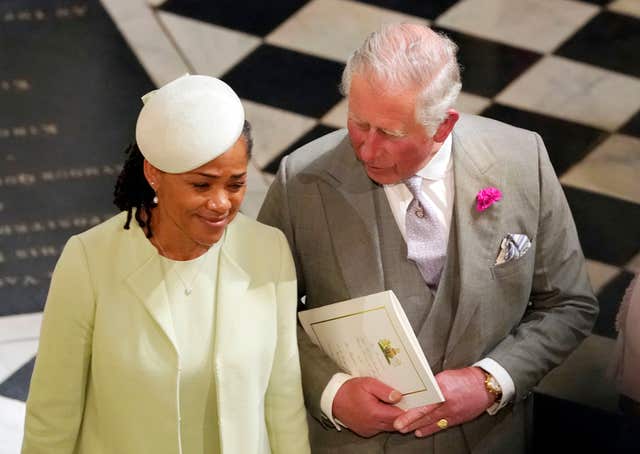 Father of the groom the Prince of Wales and mother of the bride Doria Ragland in the chapel following the wedding (Owen Humphreys/PA)